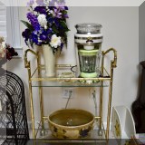 F31. Brass bamboo design bar cart with glass shelves. 36.5”h x 29”w x 18”d